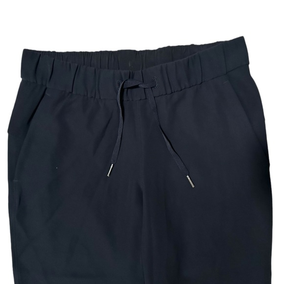 Lululemon On The Fly Crop Woven 23" Mid Rise Wrinkle Free Athleisure Black Sz 6 - Picture 6 of 12